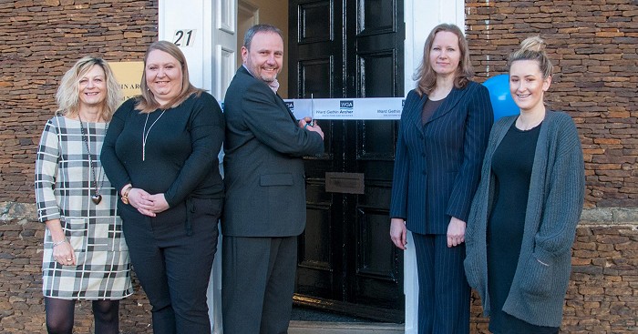 Cutting the ribbon at the new Downham Market office, from left to right, Andrea Holland, Charlotte Williamson, Adrian Long, Rosie Herbert and Danielle Blanchard