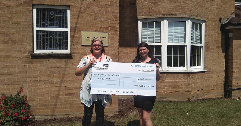 Chatteris office raise funds for East Anglian Air Ambulance